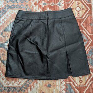 Faux leather mini skirt with slit